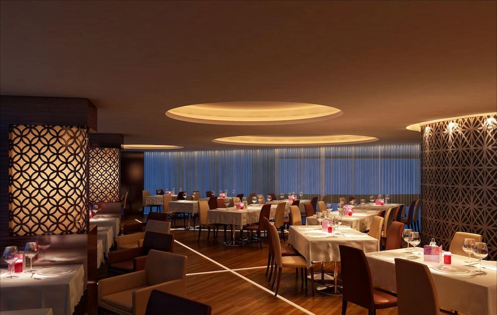 Fraser Suites Diplomatic Area Bahrain Manama Exterior foto The restaurant